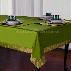 green table cloth with a gold border